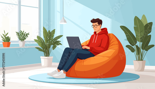 Man working remotely on a laptop from the comfort of his home, embracing the flexibility of work from anywhere and remote work