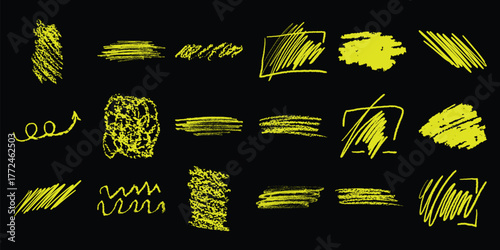Collection of Yellow Chalk Scribbles and Strokes on Black Background
