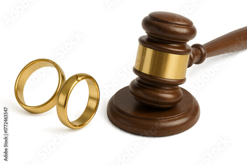Divorce concept showing gavel and wedding rings