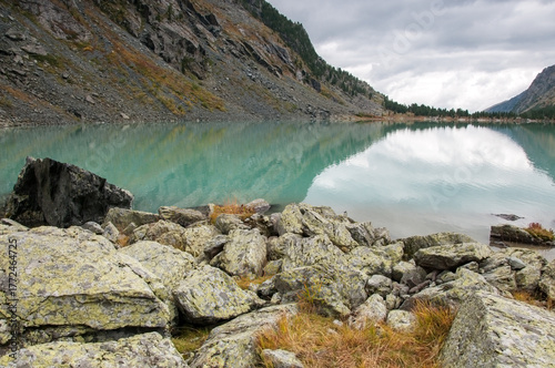 View on lake Kuyguk in late august, its shoreline covered with huge boulders, the Altai Republic, Russian Federation