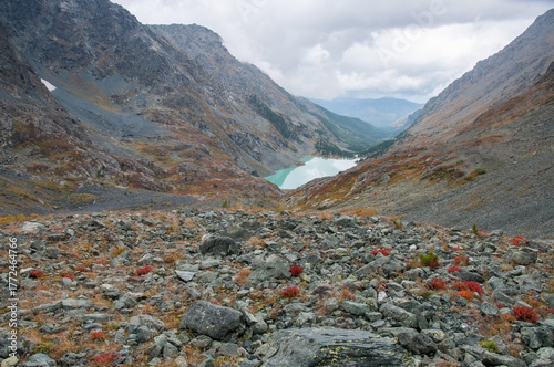 Landscape view on rocky Kuiguk valley and lake Kuiguk, glacial lake in the Altai mountains, Russian Federation
