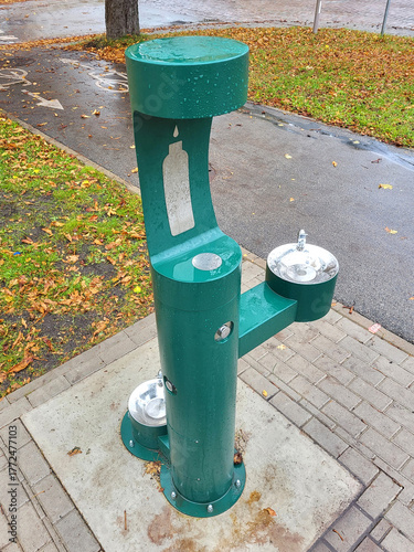 Drinking fountain water pump dispenser stream atmospheric bubbler streets free no charge for people kids dogs animals button