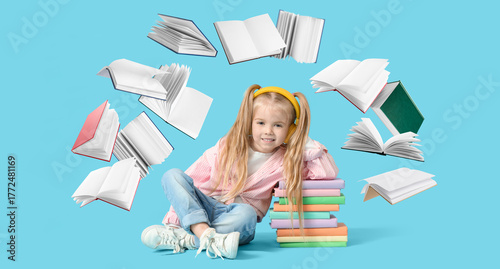 Cute little girl in headpho...