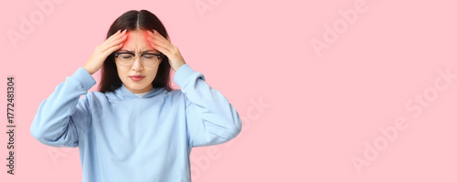 Young Asian woman suffering...