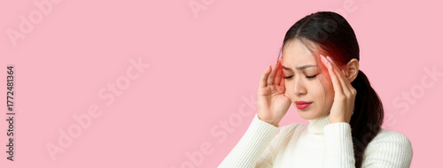 Young Asian woman suffering...