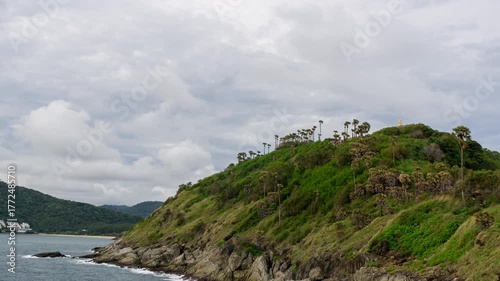 Sunset timelapse at Promthep Cape in Phuket with ocean waves, tropical coastline and colorful evening sky