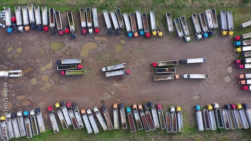 Aerial top down view to many parked trucks near to wheat depot in Burgas, Bulgaria