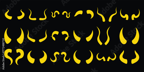 Collection of Yellow Horns and Antlers on a Black Background