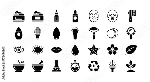 Set of solid glyph icons for skincare, beauty products, and natural cosmetic tools for wellness and self-care routines
