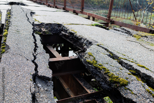 An old, destroyed road on a bridge