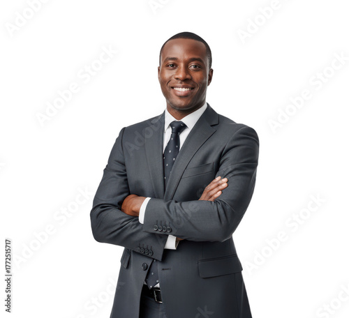 A smiling man in a formal suit with crossed arms, against transparent background