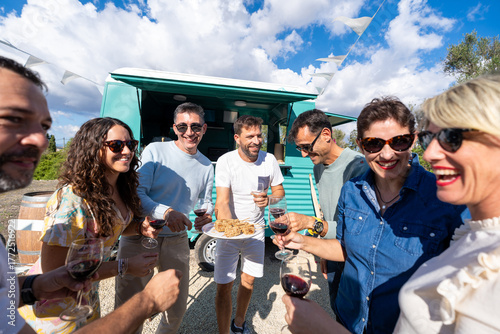 Photography Friends enjoying food and wine at summer food truck party
