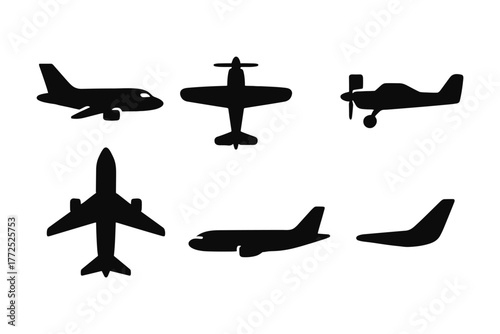 Airplane silhouette set featuring various aircraft designs in black