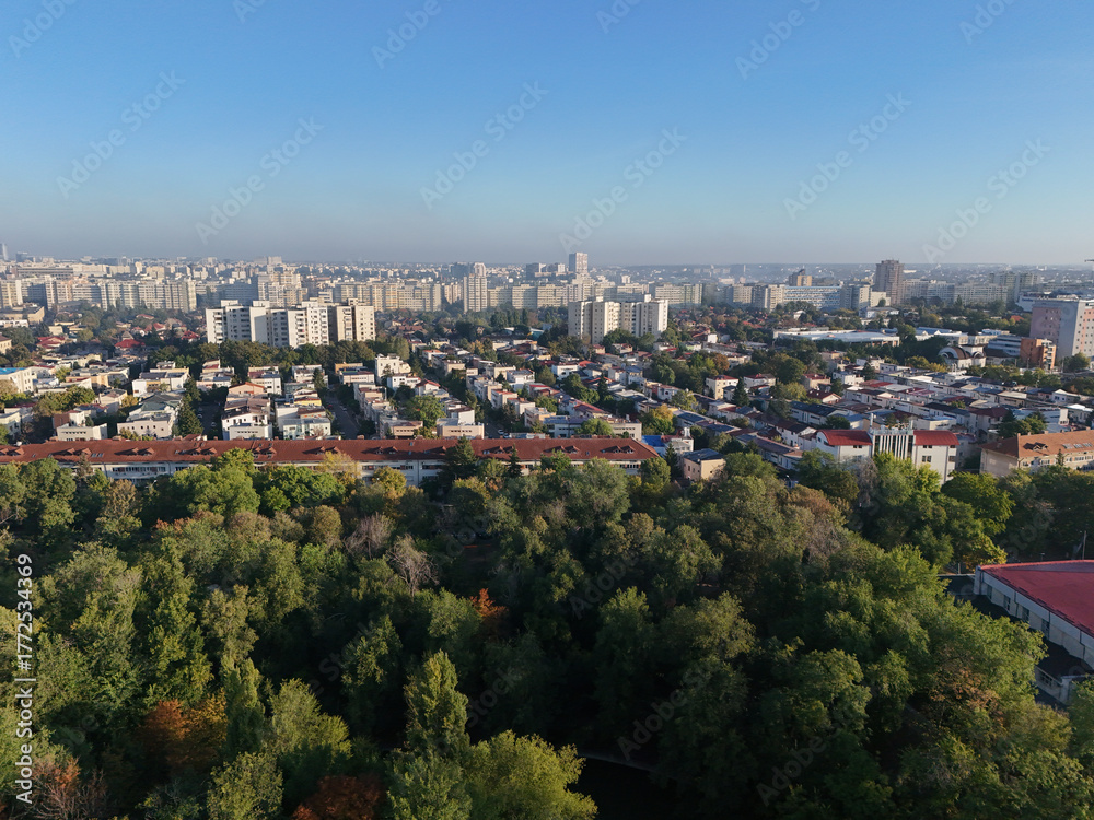 Obraz premium Aerial view of a neighborhood of Bucharest on a misty morning.