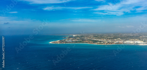 Aerial View of Aruba Island with Turquoise Waters, White Sand Beaches, and Coastal Resorts in the Caribbean Sea
