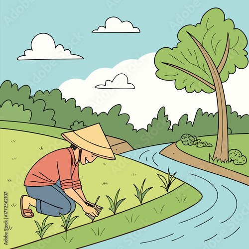 Asian farmer wearing a conical hat kneels, planting seedlings near a flowing river