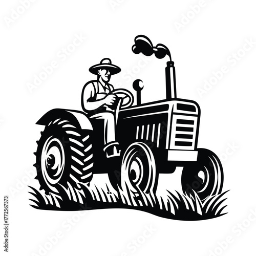 Farmer drives the tractor across the black and white grass field with smoke emitting upward