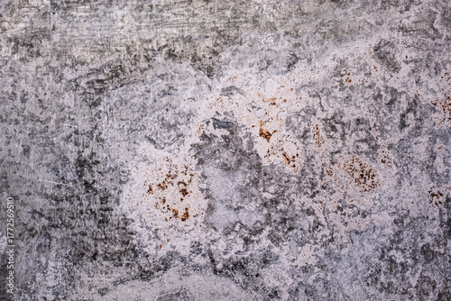 Abstract background of gray and white granite with orange accents