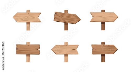 Collection of wooden directional signs with arrows and planks