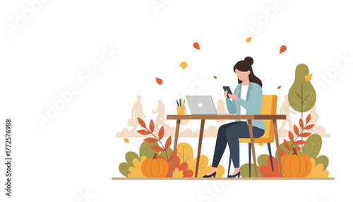 Businesswoman working outdoors in autumn with laptop and smartphone