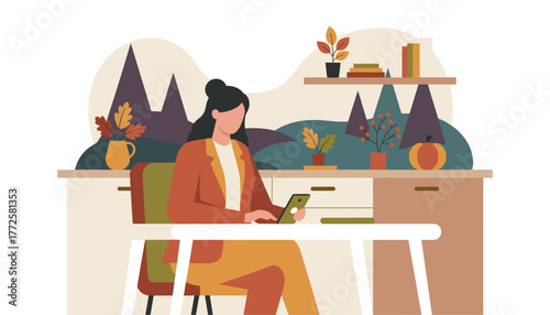 Woman works remotely using a smartphone in a cozy fall home office setting