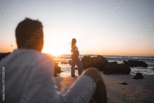 silhouette of a couple on the beach