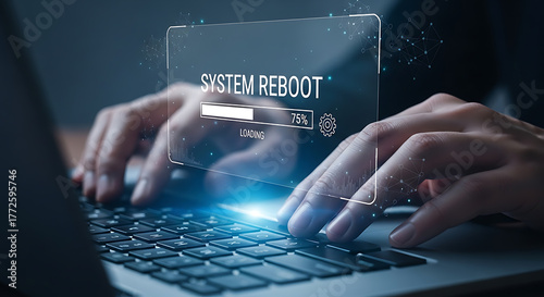 System reboot process is shown on a laptop computer with a progress bar at 75 percent.