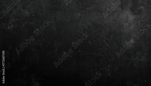 Obraz na płótnie Black background featuring a grunge texture, suitable for editorial header background