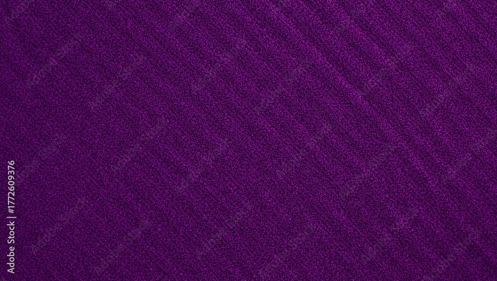 Fototapeta premium Close-up of ribbed purple velour fabric with diagonal weave pattern