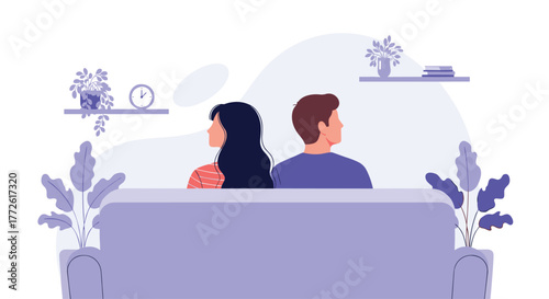 A couple sits side-by-side on a lavender sofa, facing forward in a cozy, modern living room with plants and wall shelves.