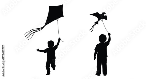 Silhouettes of children flying kites against a bright white background