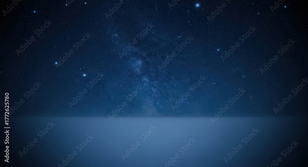 Obraz premium Starry night sky over a dark, flat landscape