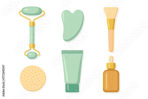 Jade roller, gua sha stone, cosmetic brush, and serum bottle for skincare routine