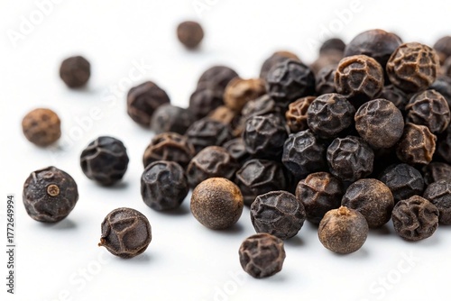 Black peppers on white background