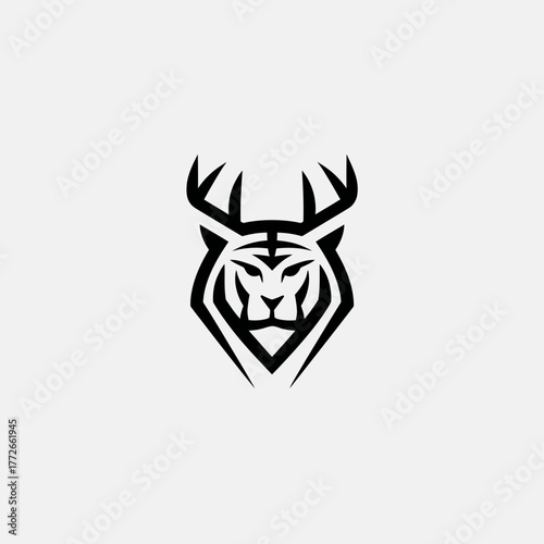 Majestic black and white abstract tiger head with deer antlers. Powerful wildlife fusion geometric vector graphic design icon.