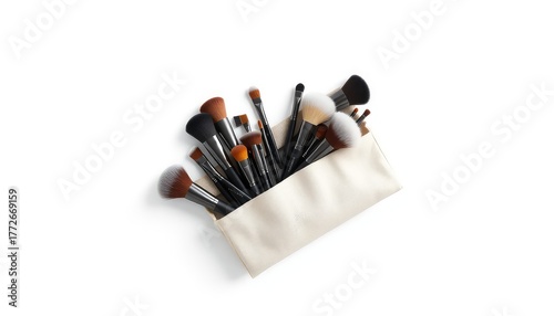 Assorted professional cosmetic brushes with black handles in a beige pouch, against a clean, minimalistic white backdrop