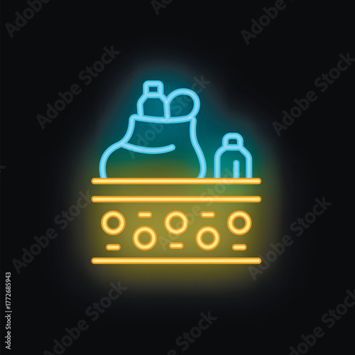 Bright and colorful neon baggage claim sign illuminating the night with its vibrant glow