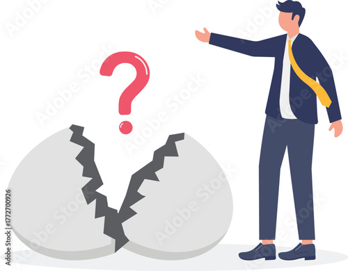 ambitious businessman worker just hatched from cracked egg.
