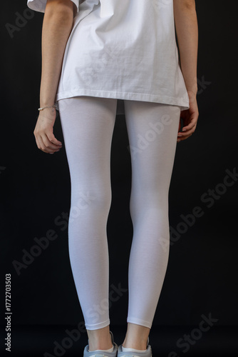 Model wearing white leggings highlighting shape, Mockup presenting waist and overall contour clearly