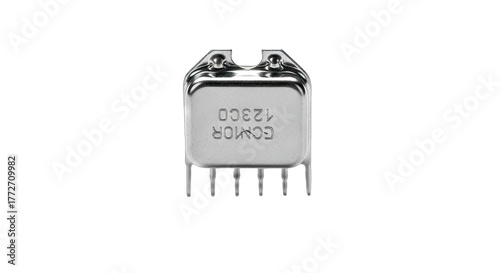 Wallpaper Mural Close-up of a vintage electronic component a small silver-colored integrated circuit with visible pins isolated on a white background showcasing its intricate design and historical significance in. Torontodigital.ca