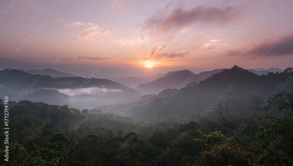 Obraz premium Misty sunrise illuminating mountain peaks, showcasing seasonal change