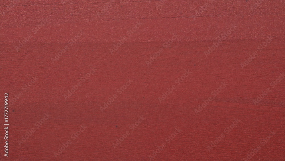 Fototapeta premium Textured wooden surface with a smooth, reddish-brown finish and slight color variations