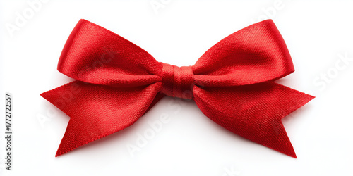 Red bow with ribbon folds isolated on white background