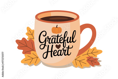 A mug with the words Grateful Heart and autumn leaves symbolizes warmth.