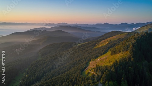 Sunrise view over mountainous terrain from above