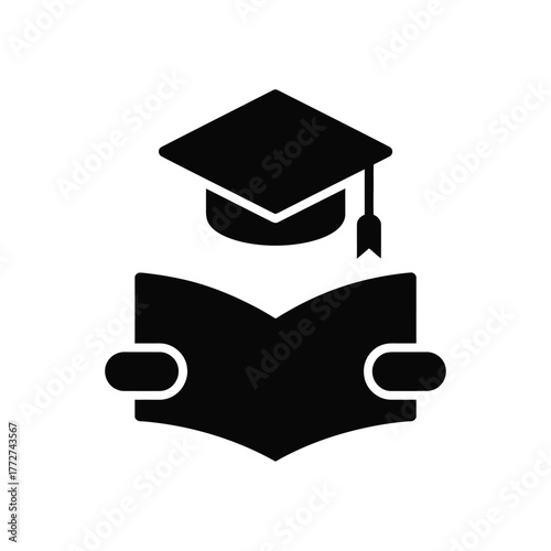Black silhouette icon of graduation cap on open book over white background