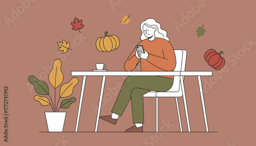 Woman using a mobile phone at a table enjoying an autumn coffee break with pumpkin decorations