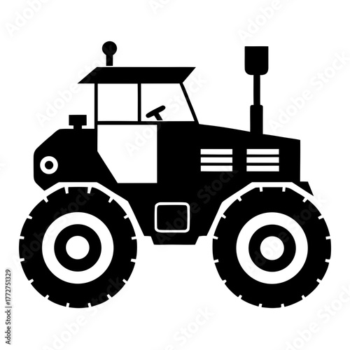 Black silhouette of a farm tractor with large wheels silhouette