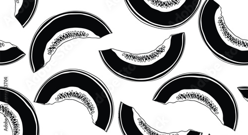 Artistic black and white slices of ripe melon create a refreshing summer pattern