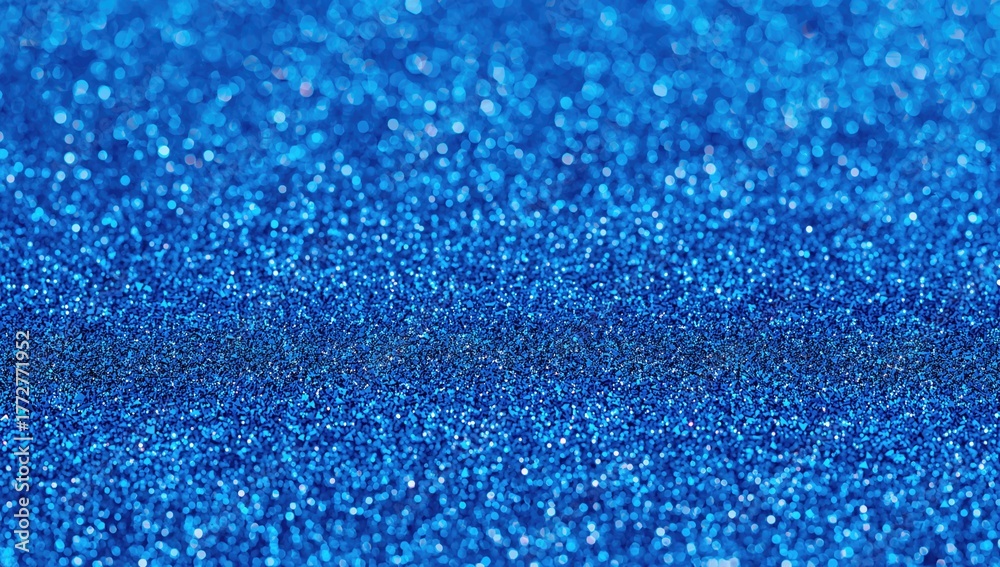 Obraz premium Full frame macro abstract texture background featuring a shimmering blue glitter surface, suitable for editorial header background
